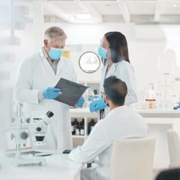 Shot of a group of scientists working together in a lab.